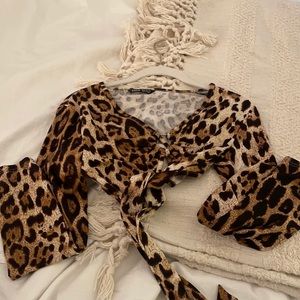 Shien open back tie cheetah print top